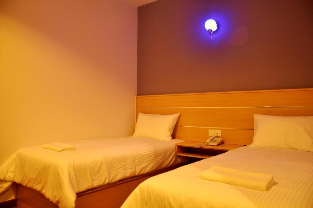 Hotel Economy Kapar Szoba fotó